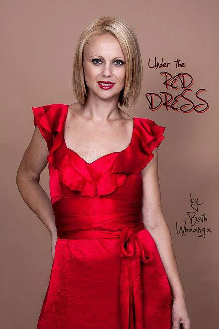 Brustkrebsüberlebende Beth Whaanga im roten Kleid